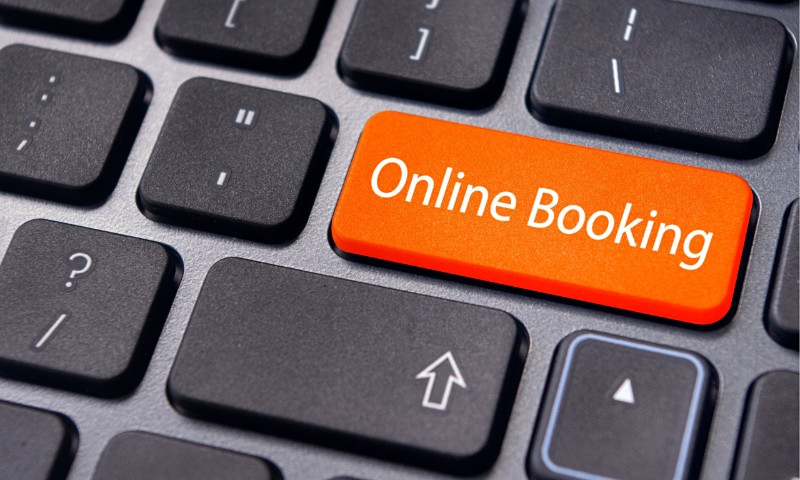 an orange keyboard button that says online booking 