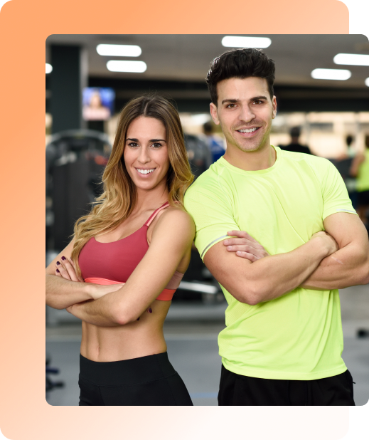 Male and female trainers and a text box stating how you can schedule your training sessions easily with Amelia WordPress gym booking plugin